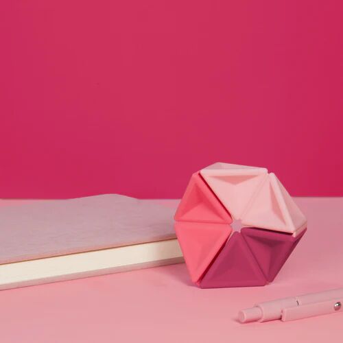 speks-pivot-silicone-fidget-pink-desk_500x.webp