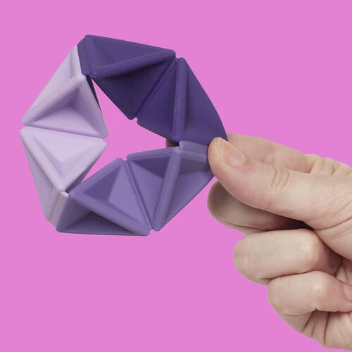 speks-pivot-silicone-fidget-purple-hand_500x.webp